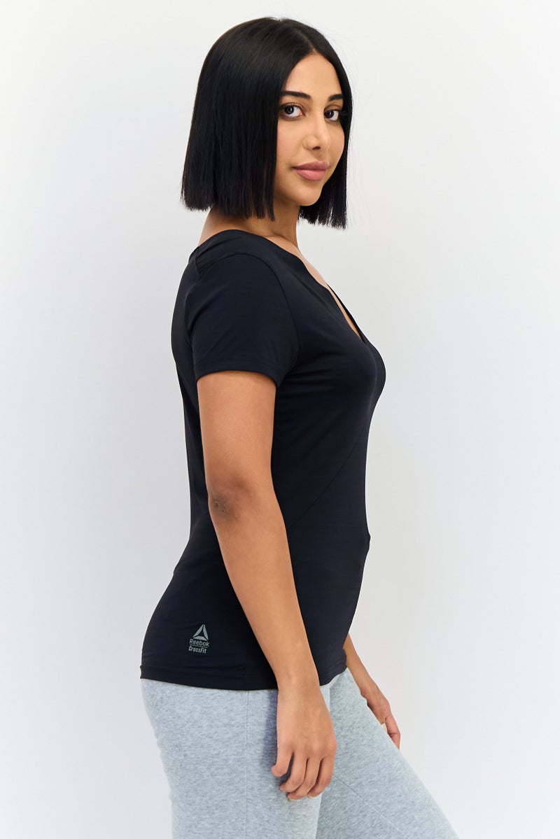 Reebok تي شيرت رياضي نسائي بلا أكمام للجري، أسود - Image 2